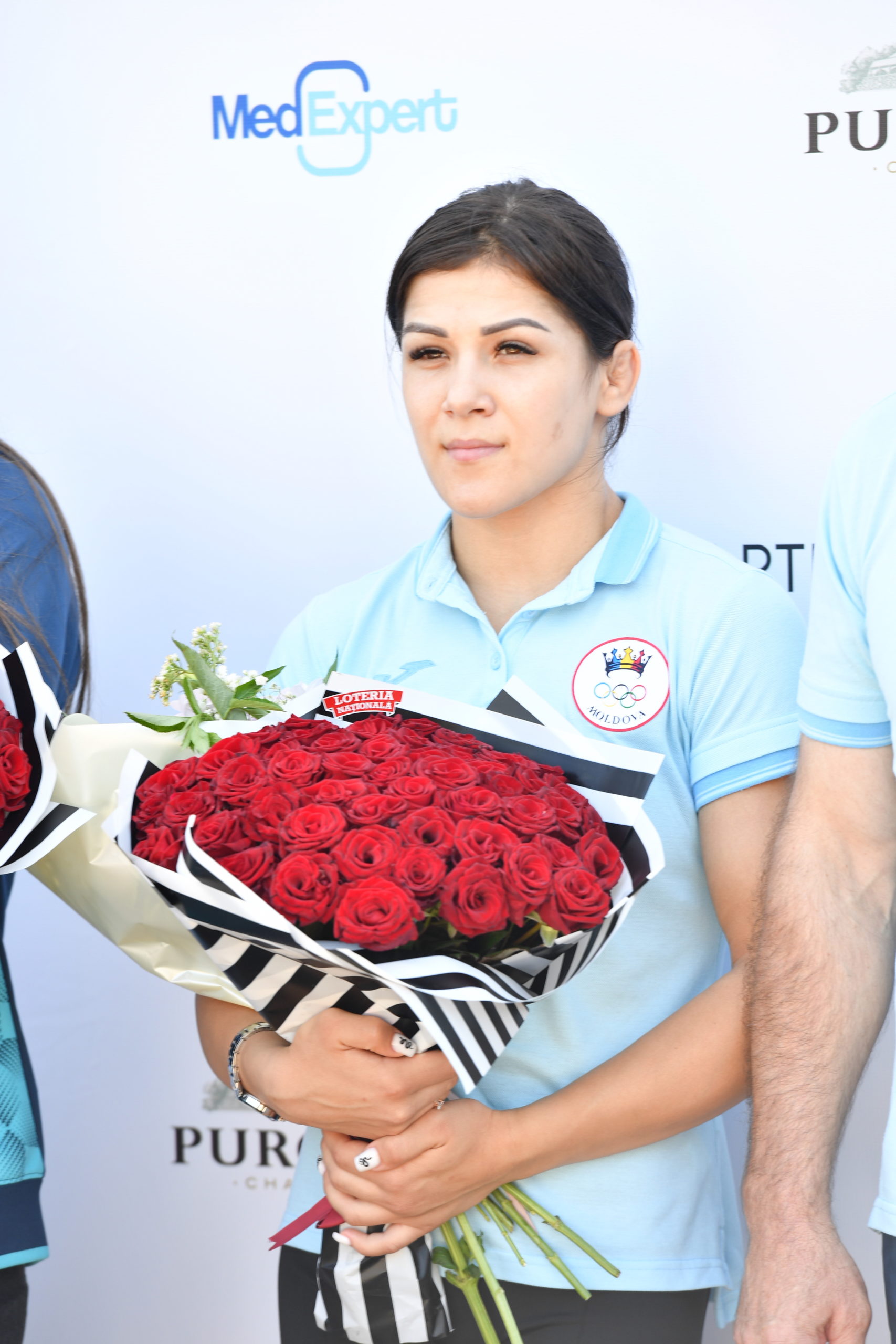 Молдавская олимпийская сборная вернулась домой. Как встречали спортсменов в аэропорту (Фото)